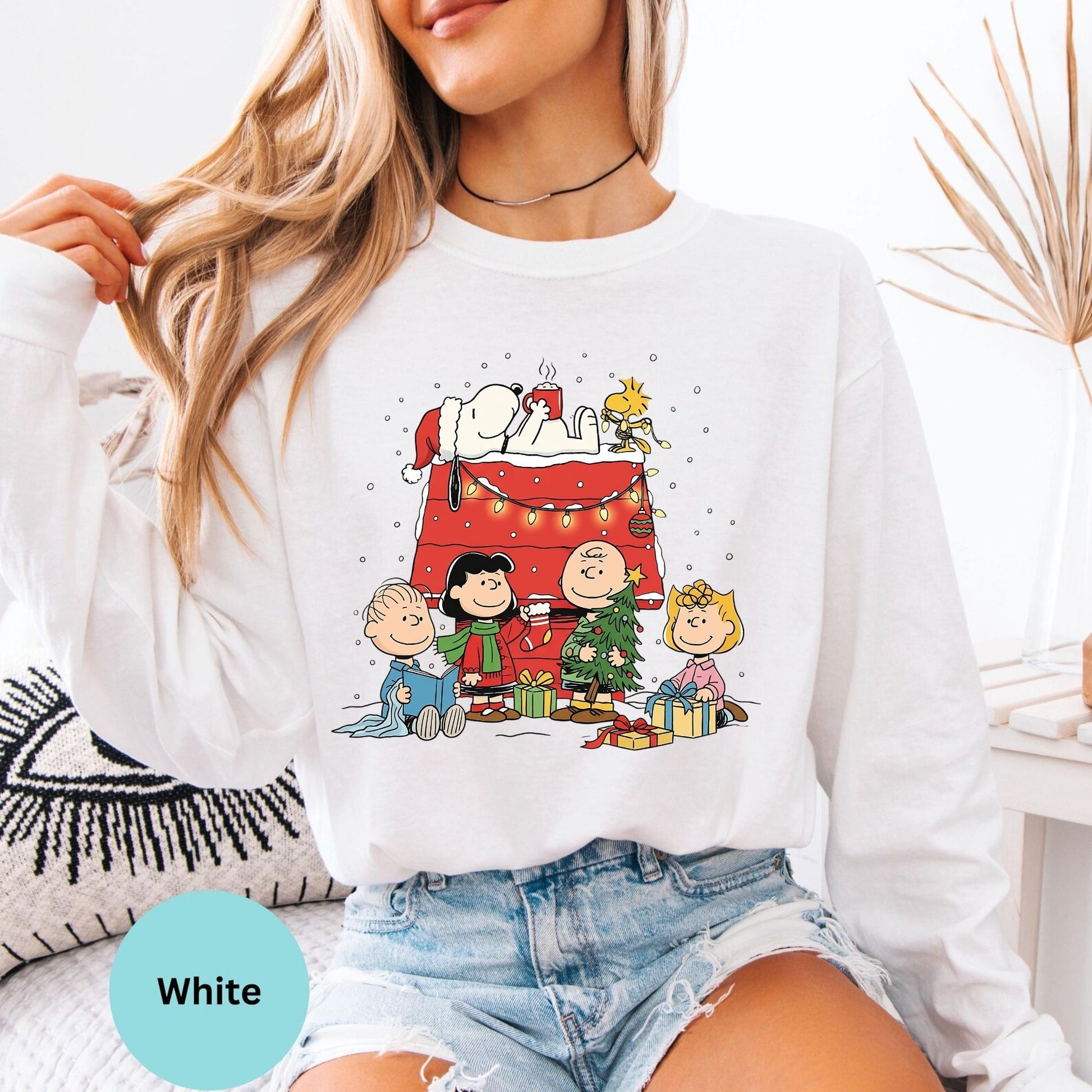 Comfort Colors® Christmas long sleeve T-shirt in White with cheerful cartoon dog family design
