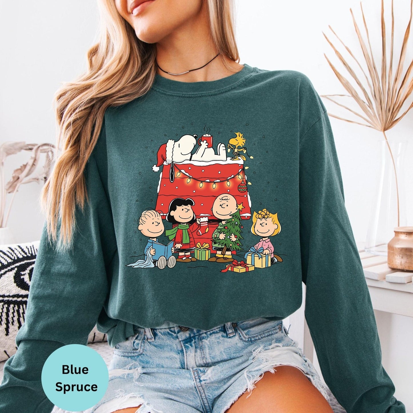 Comfort Colors® Christmas long sleeve T-shirt in Blue Spruce with festive cartoon dog family design
