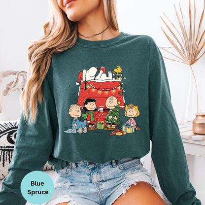 Comfort Colors® Christmas long sleeve T-shirt in Blue Spruce with festive cartoon dog family design

