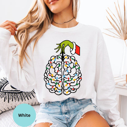 White long sleeve woman wearing colorful brain graphic design