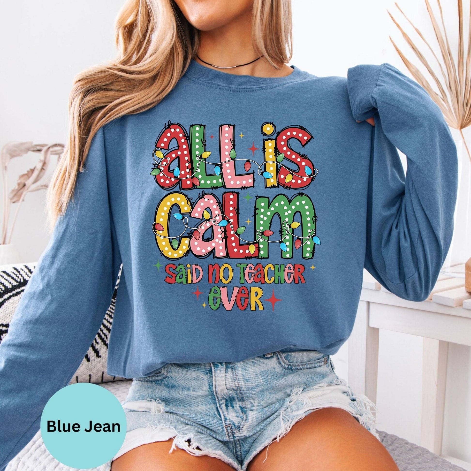 Blue Jean long sleeve woman wearing All Is Calm teacher design