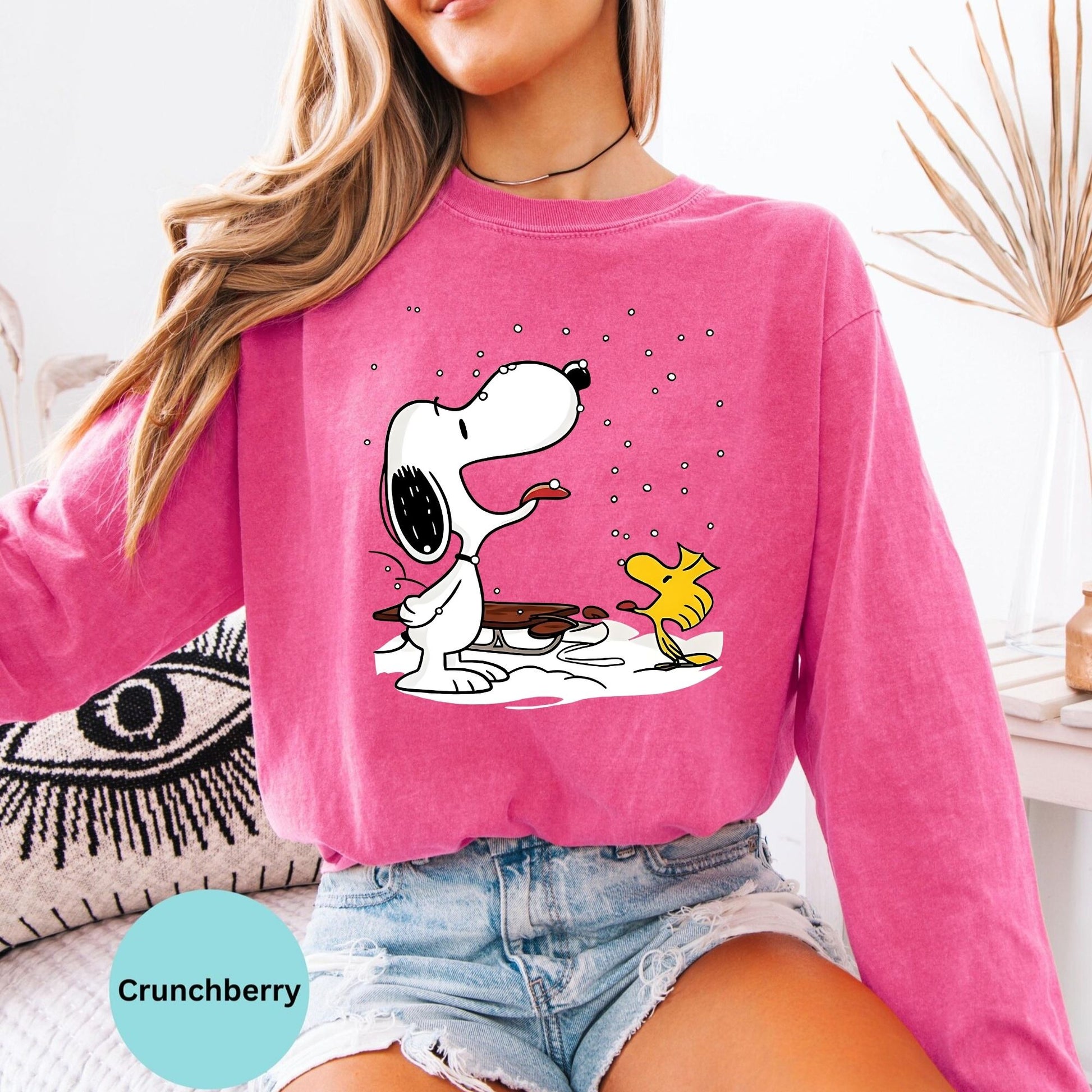 Crunchberry long sleeve woman wearing Snoopy and Woodstock graphic