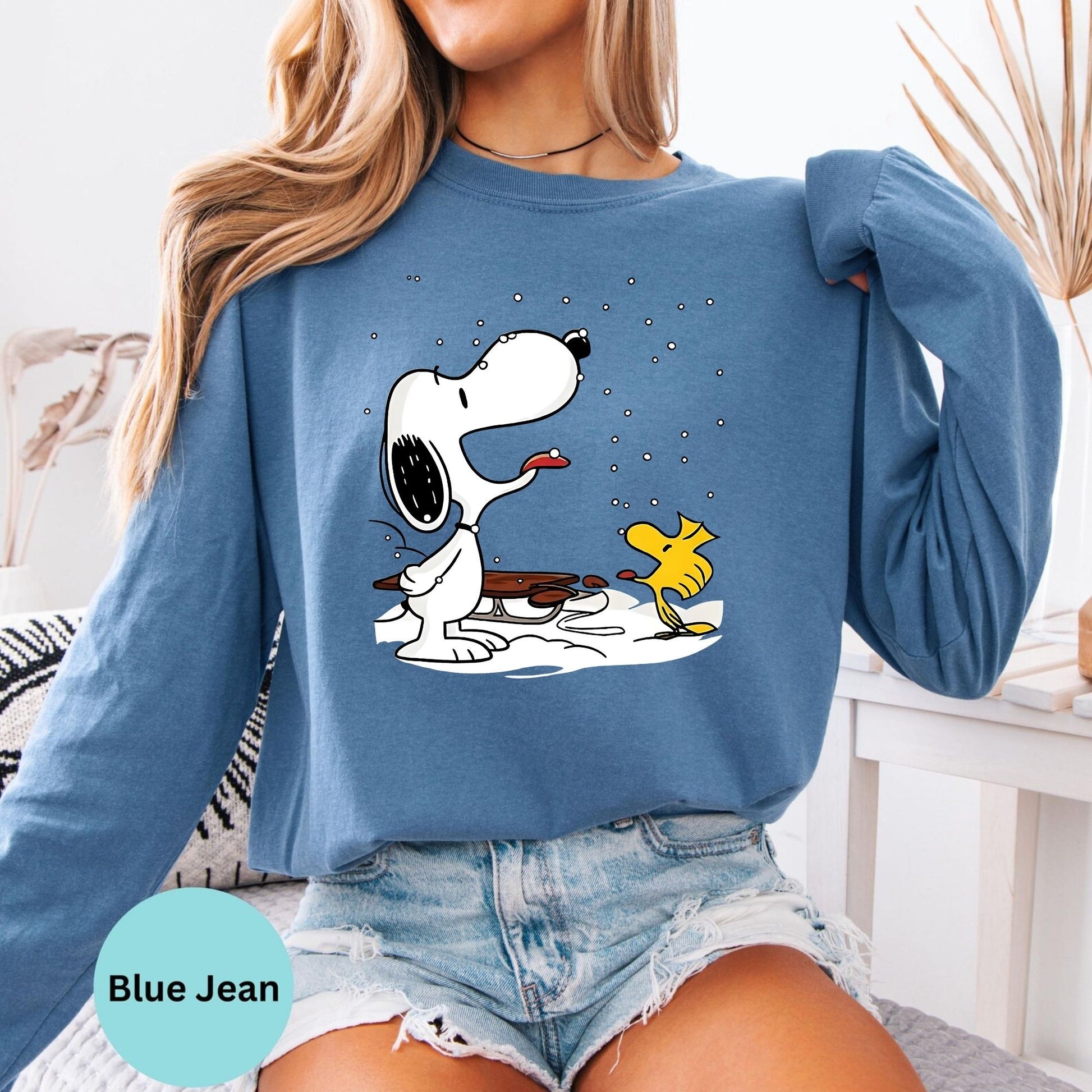 Blue Jean long sleeve woman wearing Snoopy and Woodstock design
