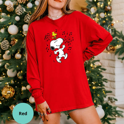 Red long sleeve with dancing Snoopy music design