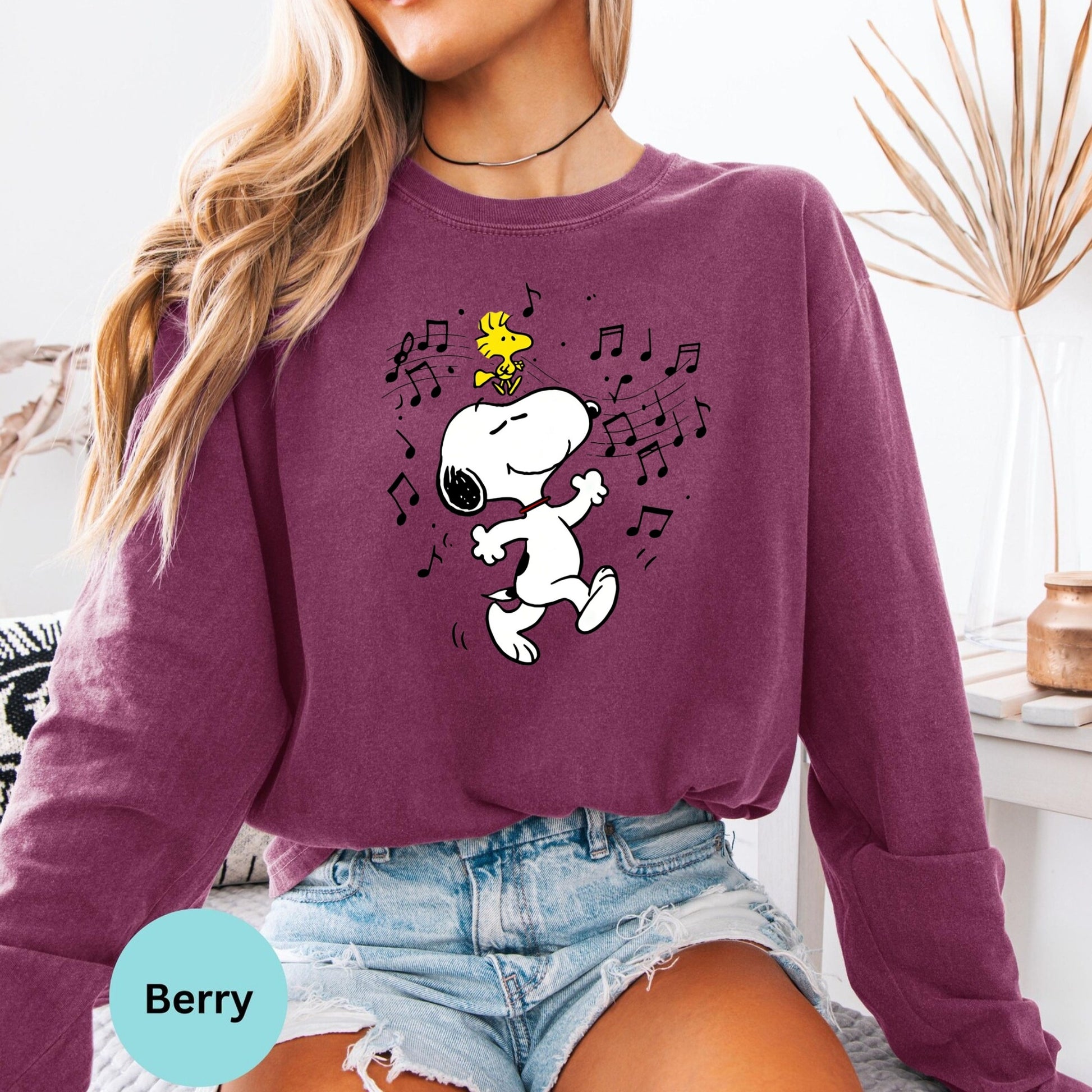 Berry long sleeve woman wearing dancing Snoopy design