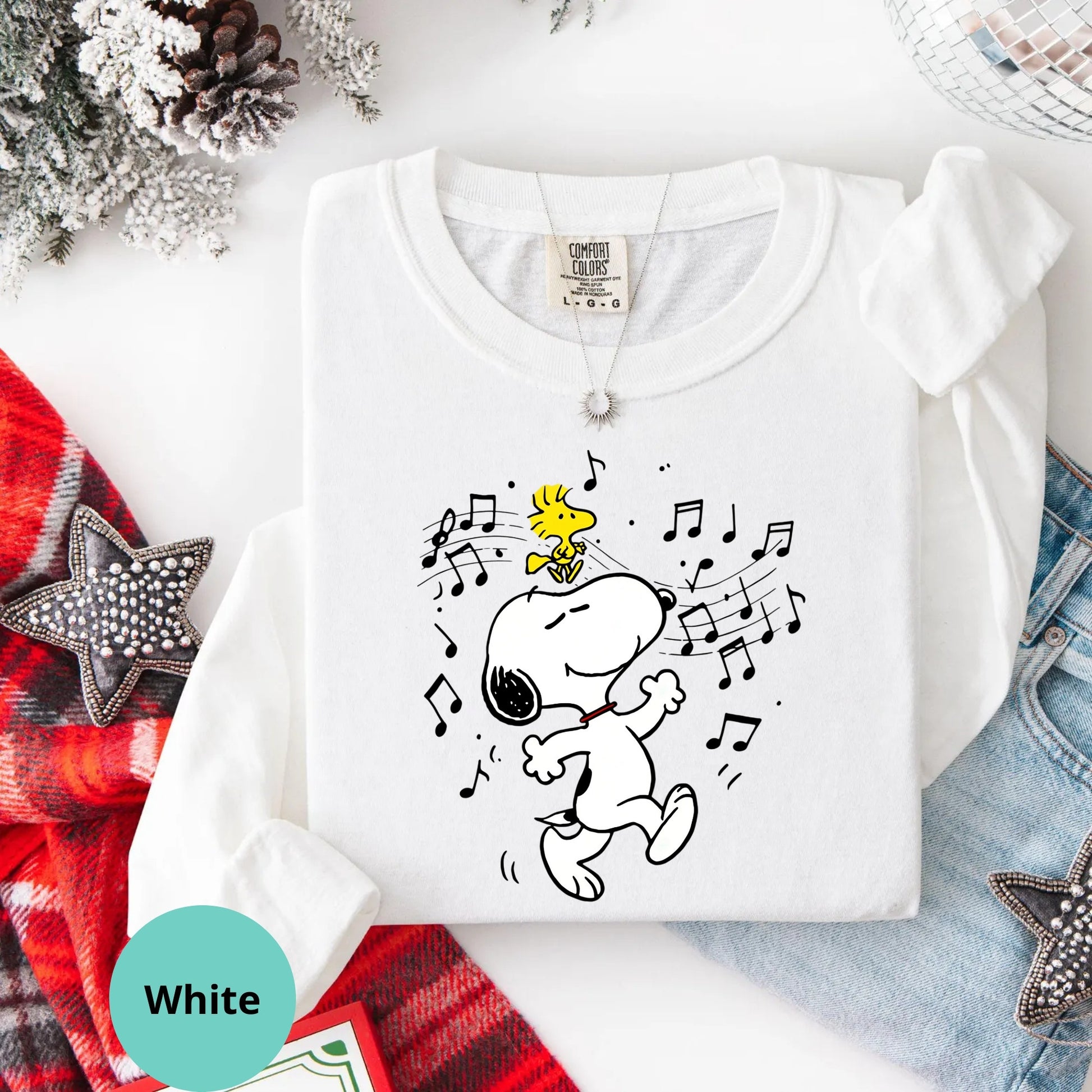 White long sleeve with dancing Snoopy music graphic