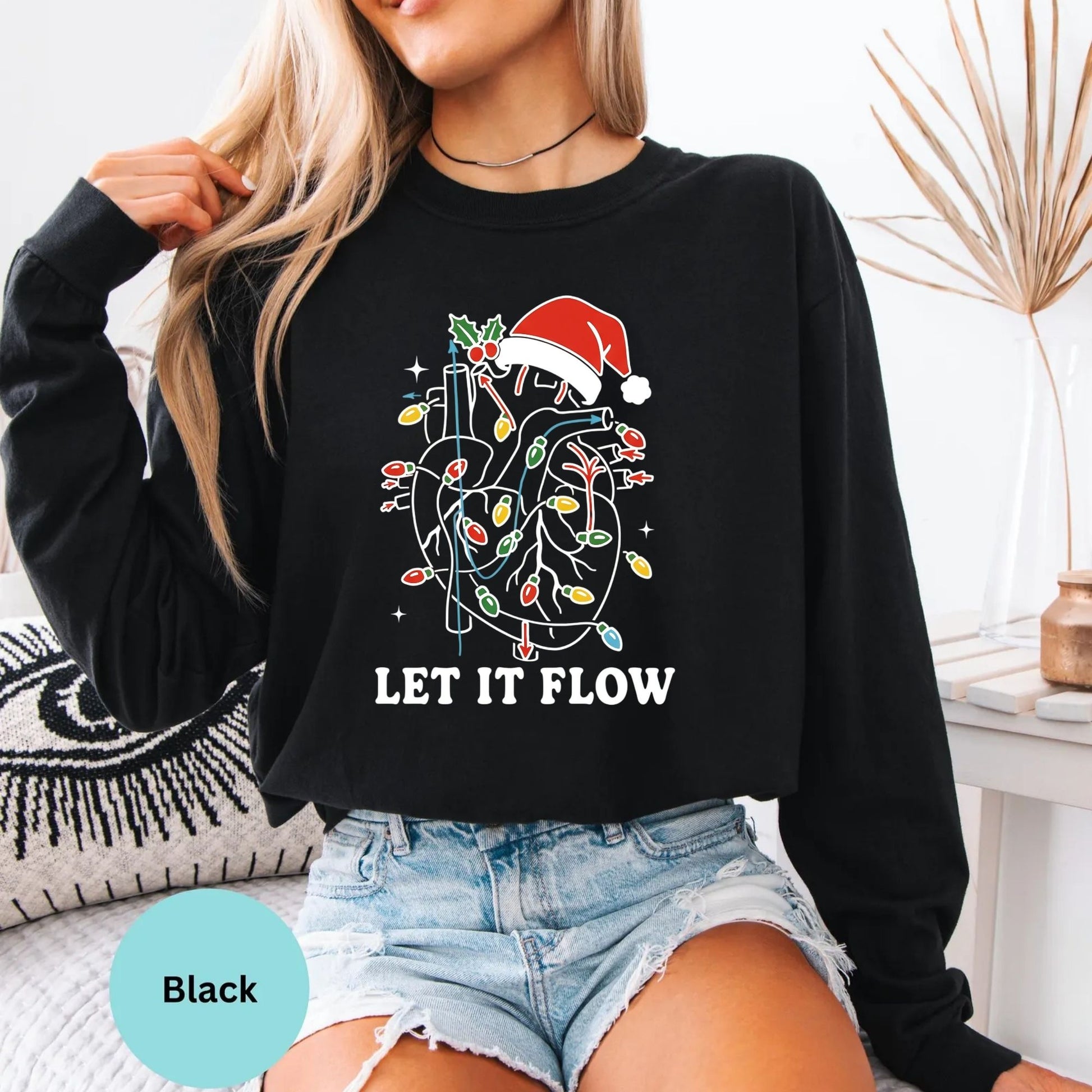 Comfort Colors Let It Flow cardiac nurse long sleeve shirt in Black, Christmas cardiology artwork.