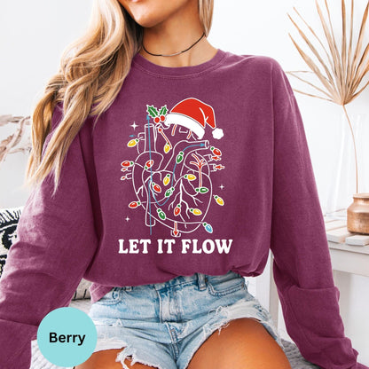Comfort Colors Let It Flow cardiac nurse long sleeve shirt in Berry, cardiology Christmas graphic.