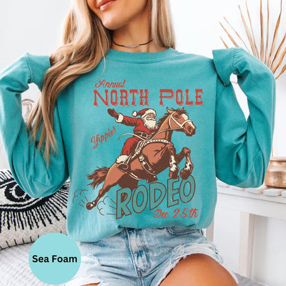 Comfort Colors® Retro Western Christmas Cowboy Santa long sleeve shirt in Sea Foam
