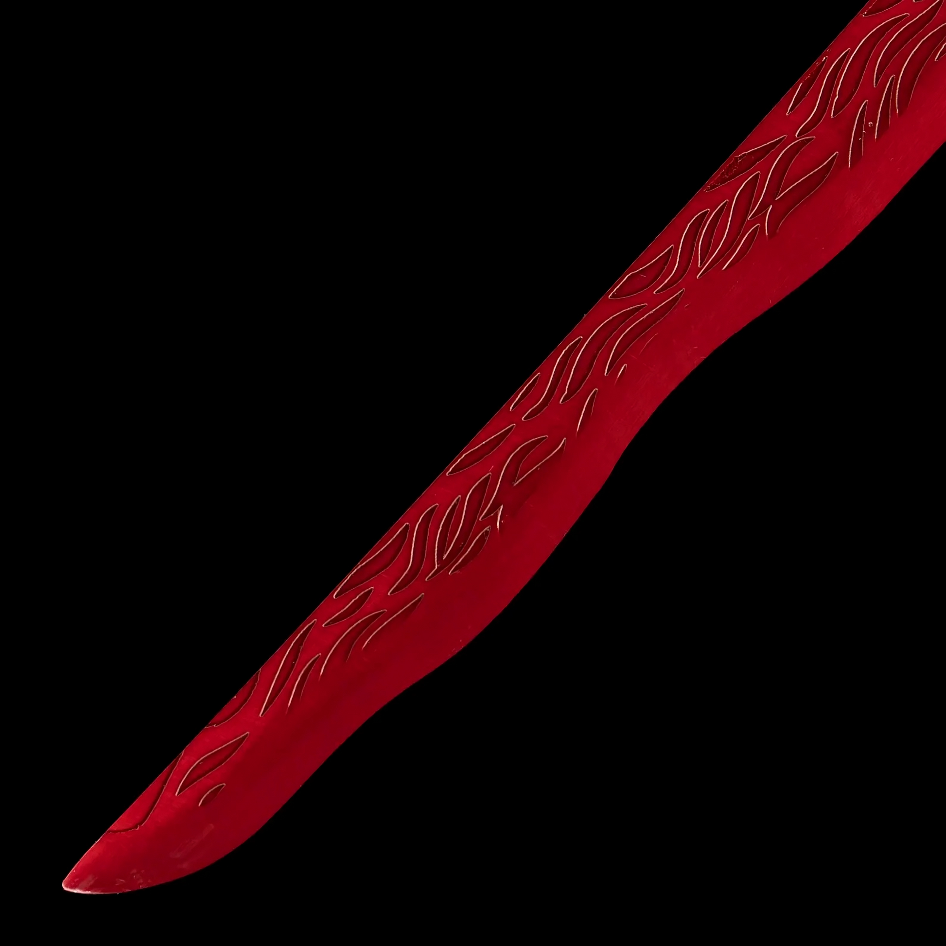 Close-up of the red wavy blade pattern from the Rivers of Blood replica.