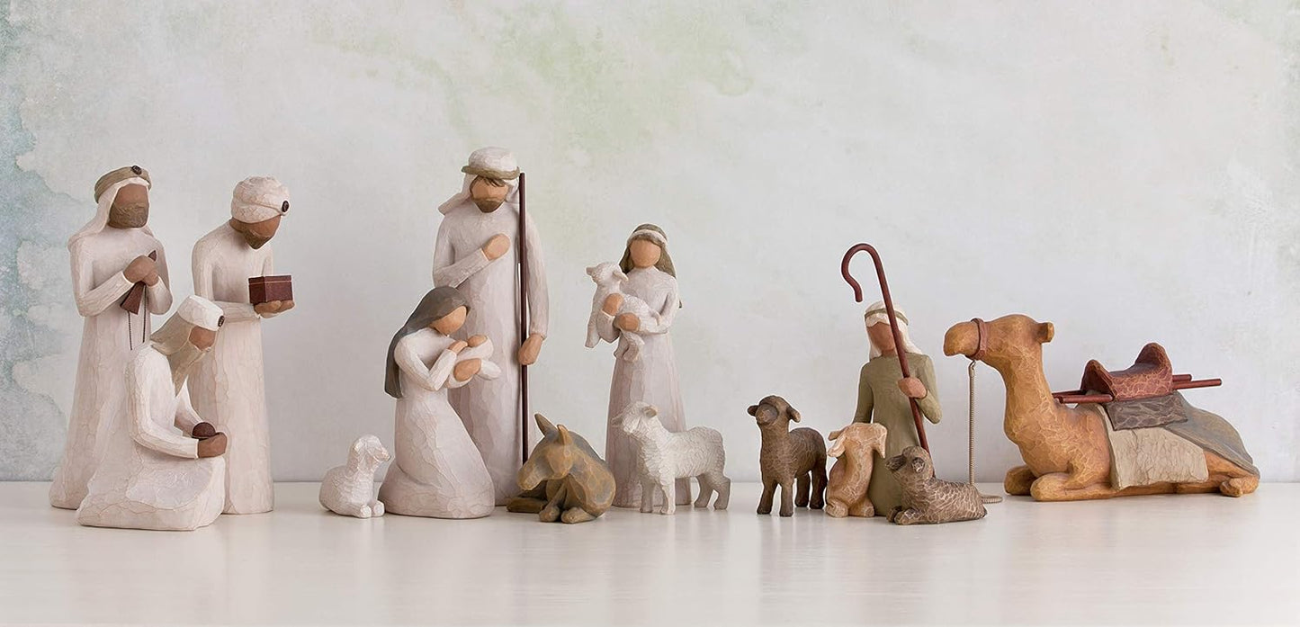 Nativity scene figurines on a light background