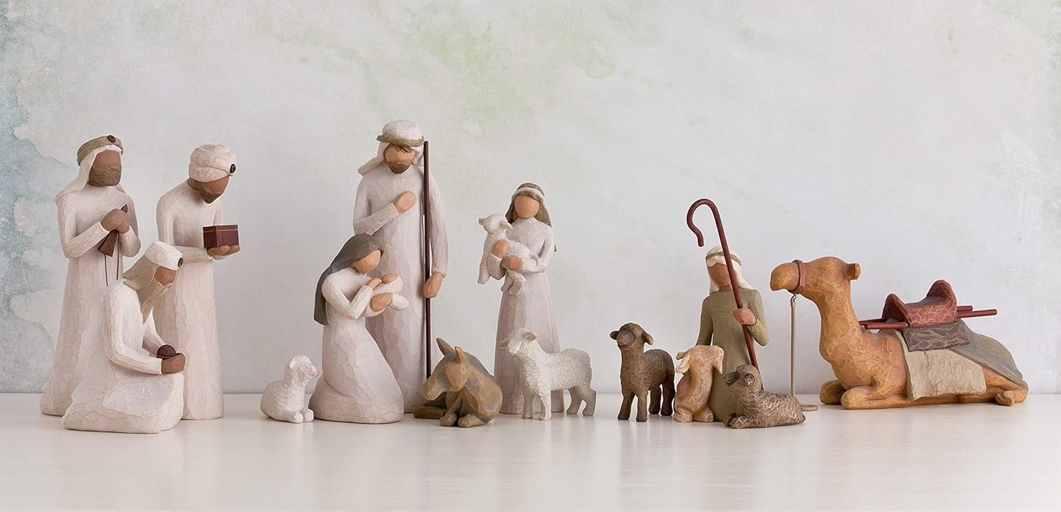 Nativity scene figurines on a light background